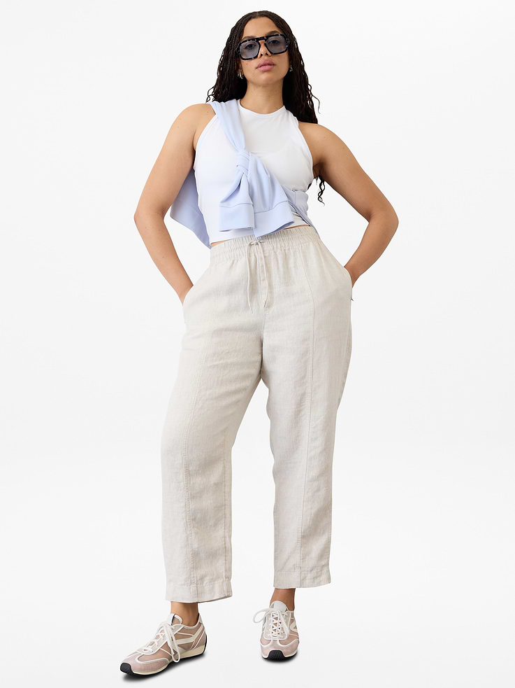 Image 1 of 7, FOR: Travel, vacation, or exploring your town or city, FEEL: Breezy, luxe softness spun from 100% certified European flax, FAVE: Two zip-up side pockets keep your stuff secure, Two drop-in back pockets for on-the-go, easy-access storage, Waistband drawcord lets you pick your fit on the fly, Product #658556