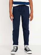 L'image numéro 1 présente Pantalon chino techno effilé à extensibilité intégrée pour Garçon