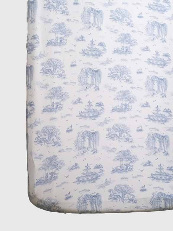 The Gilded Bird Spring Toile Blue Fitted Crib Sheet