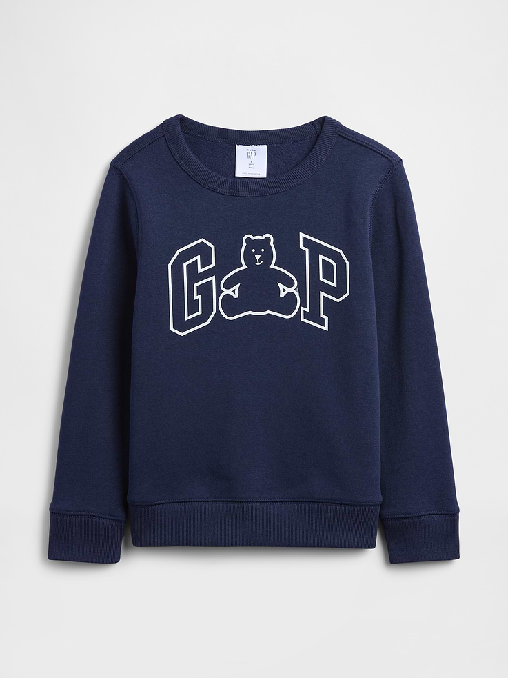 Image 1 of 3, This product is made with/contains 42% recycled polyester. Compared to virgin materials, using recycled materials helps reduce resource use and waste., Soft, comfy fleece., Long sleeves with banded cuffs., Crewneck., Gap logo at front., Banded hem., This product was made in a factory that invests in gender equity and women’s empowerment through RISE. Learn more at, Product #820975