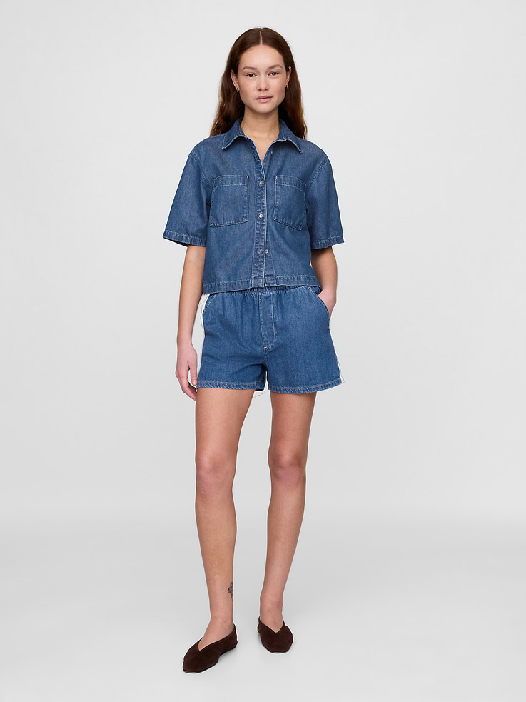 Image 1 of 9, The softest denim ever made. Our exclusive, ultra-light Tencel™ blend with an easy drape for year-round wears., Supersoft cotton-Tencel blend denim easy boxer shorts., Elasticized waist, faux fly., Side slant pockets, back welt pockets., Responsibly Made: This pair of denim shorts is made with 5% recycled cotton and is part of our Washwell program, which uses at least 20% less water as compared with conventional wash methods. We’ve saved over a billion liters of water through Washwell since 2016., This product was made in a factory that invests in gender equality and women’s empowerment. Through RISE (Reimagining Industry to Support Equality) and Gap Inc.’s program P.A.C.E. (Personal Advancement & Career Enhancement), we support people who make our clothes to build the skills, knowledge, confidence, and resilience needed to advance in work and life. Learn more here ., Product #739857