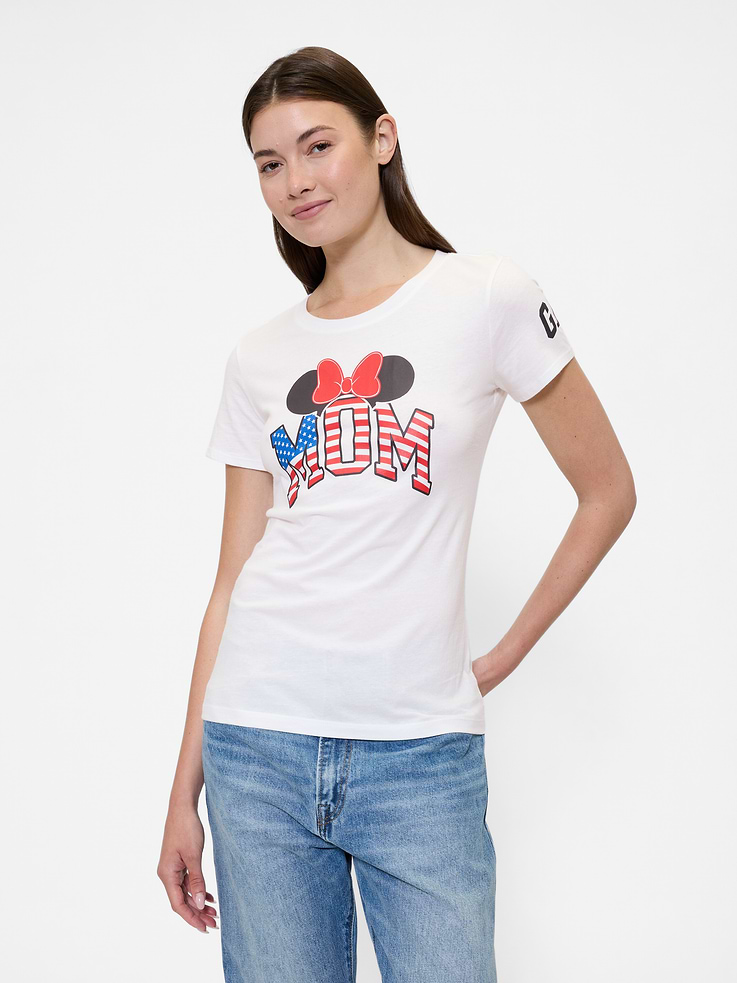 Image 1 of 5, A very special collaboration between Gap and Disney— two timeless, iconic American brands— led us to create a collection that celebrates Mickey Mouse and Minnie Mouse., Soft jersey knit., Short sleeves., Crewneck., Minnie Mouse Mom graphic at front., Product #828691