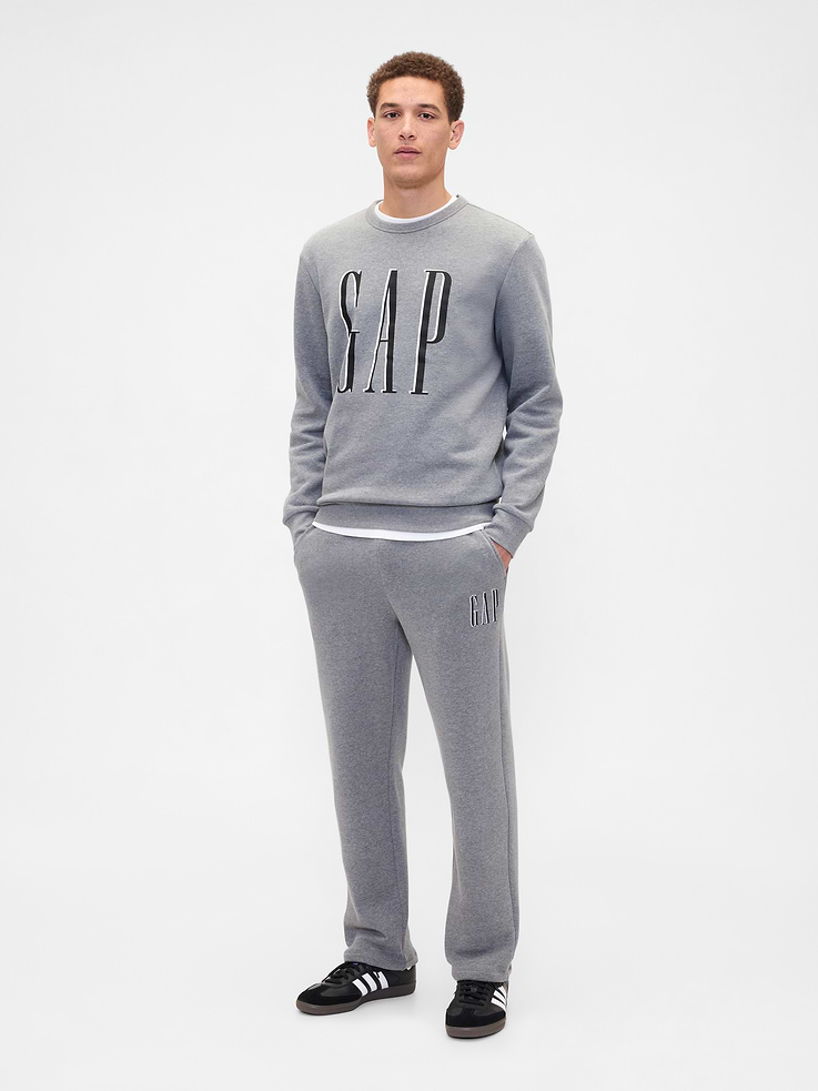 Image 1 of 4, Soft, comfy fleece., Drawcord ties at elasticized waistband., Front slant pockets., Gap logo at leg., This product was made in a factory that invests in gender equity and women’s empowerment through RISE. Learn more at, Product #672980