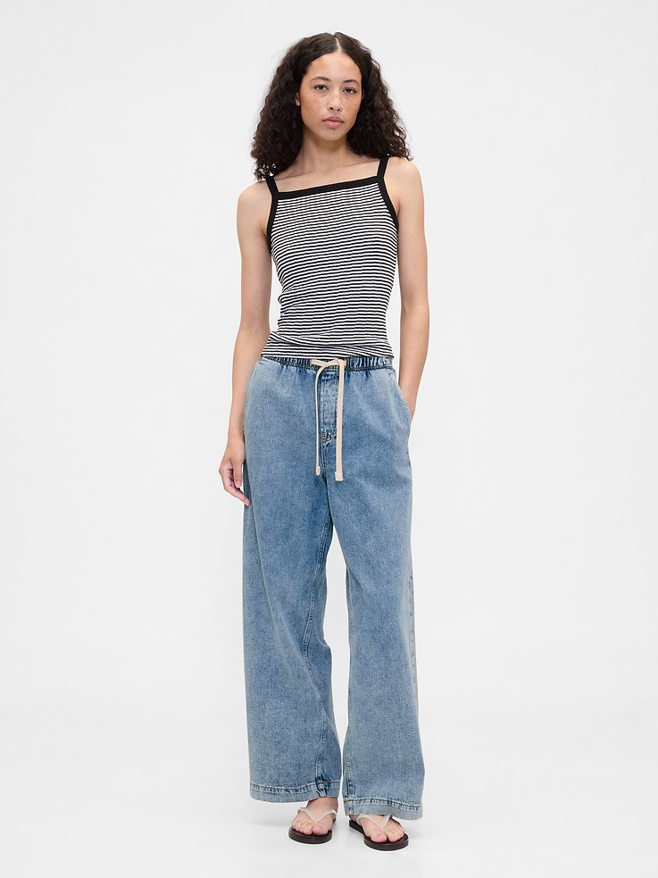Image 1 of 7, This product is made with/contains 5% recycled cotton. Compared to virgin materials, using recycled materials helps reduce resource use and waste., This product is part of our water-saving Washwell program. Compared with conventional wash methods, Washwell uses at least 20% less water., Non-stretch denim., Light indigo wash with fading., Drawcord ties at waist, faux fly., Front slant pockets, patch pockets at back., This product was made in a factory that invests in gender equity and women’s empowerment through RISE. Learn more at, Product #805640