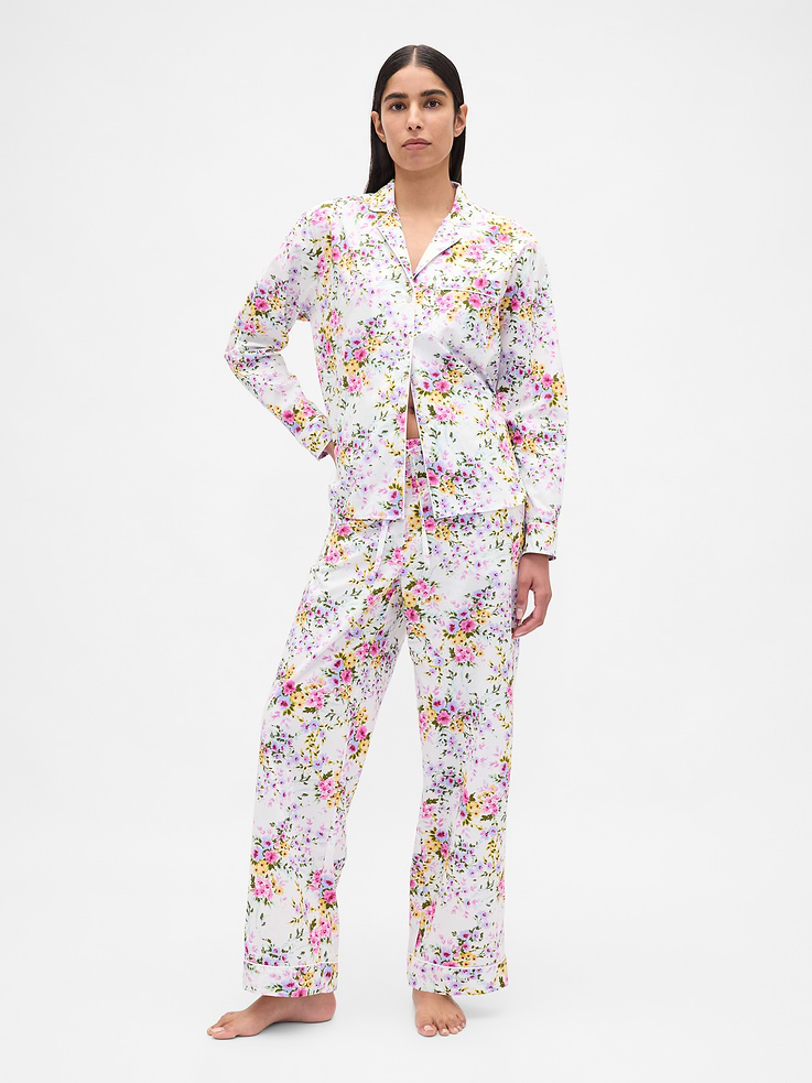 Image 1 of 6, Soft cotton poplin pajama pants., Elasticized waist., Certain styles have allover prints., This product was made in a factory that invests in gender equality and women’s empowerment. Through RISE (Reimagining Industry to Support Equality) and Gap Inc.’s program P.A.C.E. (Personal Advancement & Career Enhancement), we support people who make our clothes to build the skills, knowledge, confidence, and resilience needed to advance in work and life. Learn more here ., Product #531506