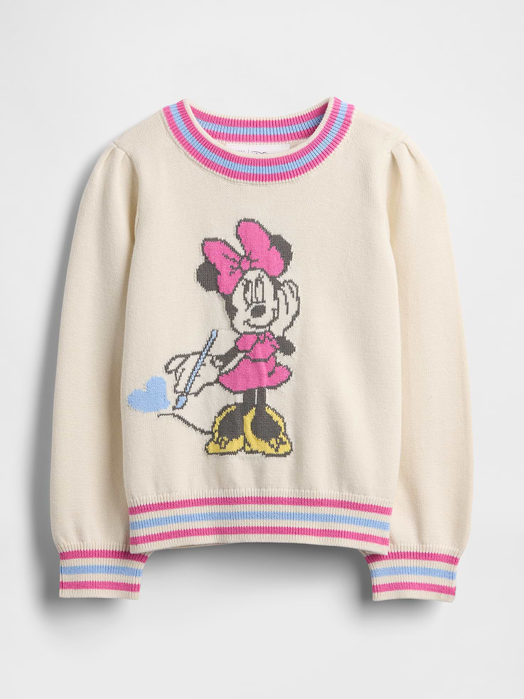 Image 1 of 2, Gap and Disney. Two timeless American brands. One collection that celebrates Mickey Mouse and Minnie Mouse., Soft knit cotton sweater., Ribbed crewneck., Long sleeves with ribbed cuffs., Minnie Mouse graphic at front., Striped detail at neckline, sleeves, and ribbed hem., This product was made in a factory that invests in gender equity and women’s empowerment through RISE. Learn more at gapinc.com/equity., Product #816015