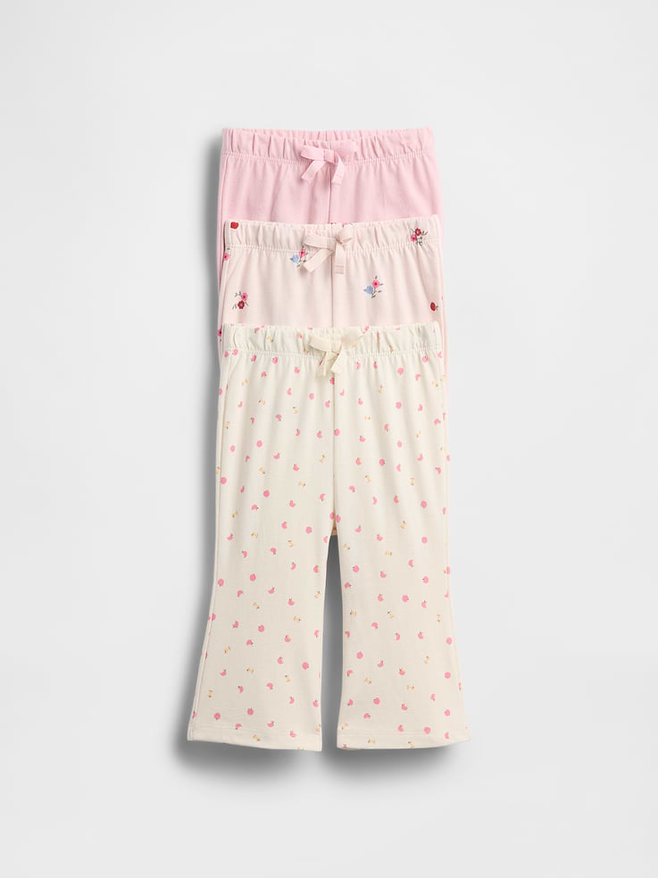 Image 1 of 2, From baby’s first outfit to all their first moments. Our favorite tiny essentials in supersoft, organically grown cotton., Soft cotton jersey pull-on pants., Elasticized waist with front tie detail., Certain styles have banded cuffs or a flare leg opening., Assorted colors & prints., Made with 100% organically grown cotton which is grown without the use of synthetic pesticides and fertilizers., This product was made in a factory that invests in gender equity and women’s empowerment through RISE. Learn more at gapinc.com/equity., Product #832854