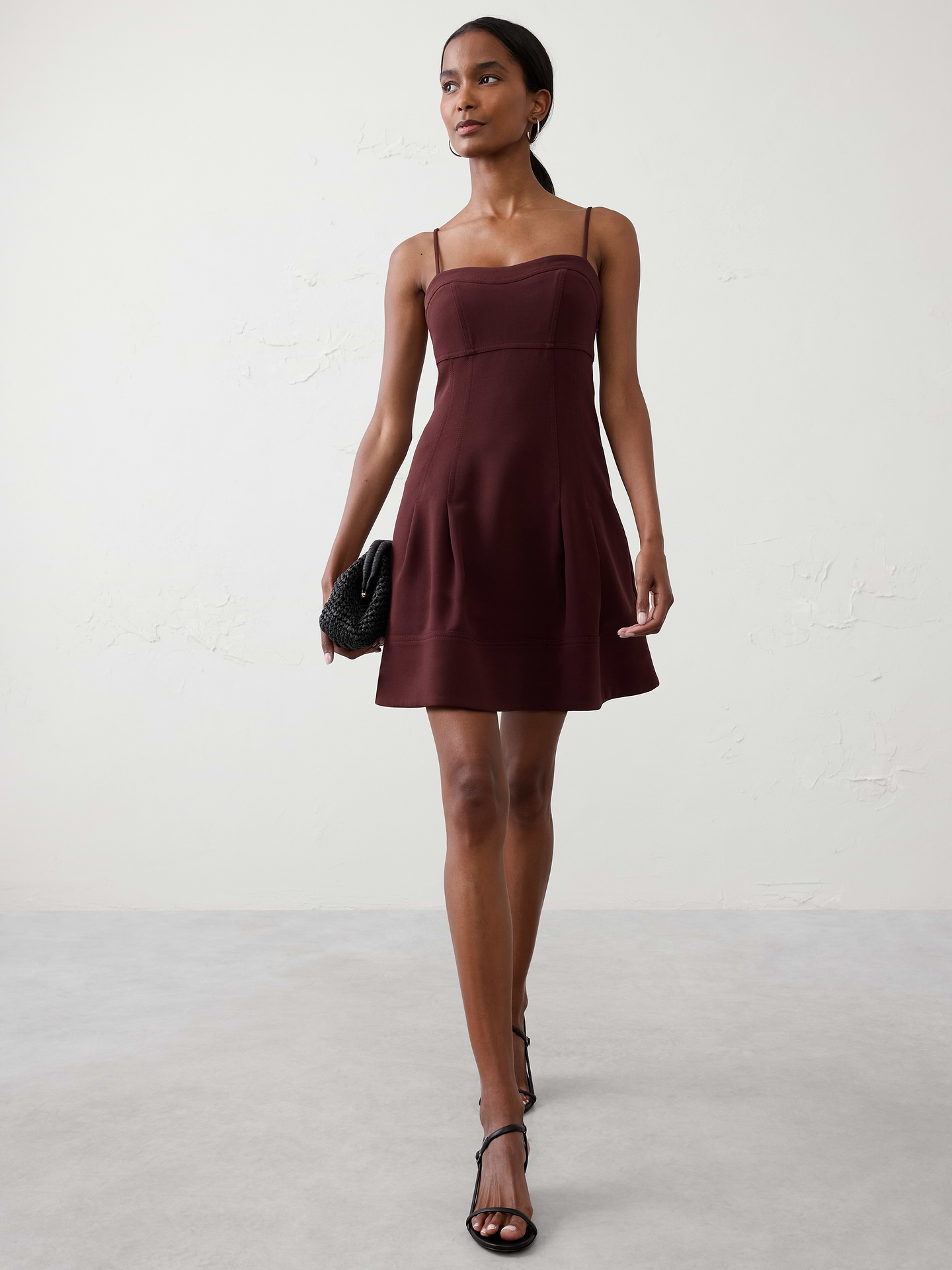 Image 1 of 4, Sweetheart neckline. Adjustable spaghetti straps., Empire waist., Features seamed detailing on bodice and back., Invisible side zipper at wearer's left., Pleated skirt., Flared seamed hem., Fully lined., Made exclusively for Banana Republic Factory., Product #813576