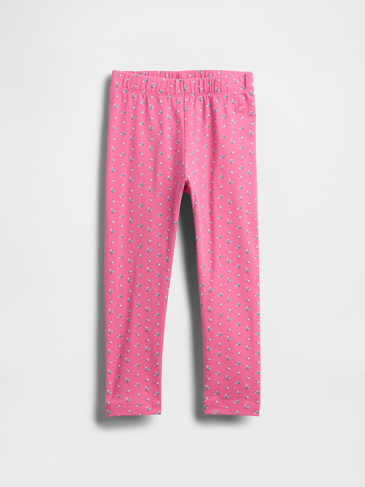 Image 1 of 2, Our favorite mix-and-match essentials go from tummy time to playtime in no time. All made with soft cotton in playful prints and bright colors., Soft, stretch jersey knit leggings., Elasticized waist., Certain styles have allover prints., This product was made in a factory that invests in gender equality and women’s empowerment. Through RISE (Reimagining Industry to Support Equality) and Gap Inc.’s program P.A.C.E. (Personal Advancement & Career Enhancement), we support people who make our clothes to build the skills, knowledge, confidence, and resilience needed to advance in work and life. Learn more here ., Product #525365