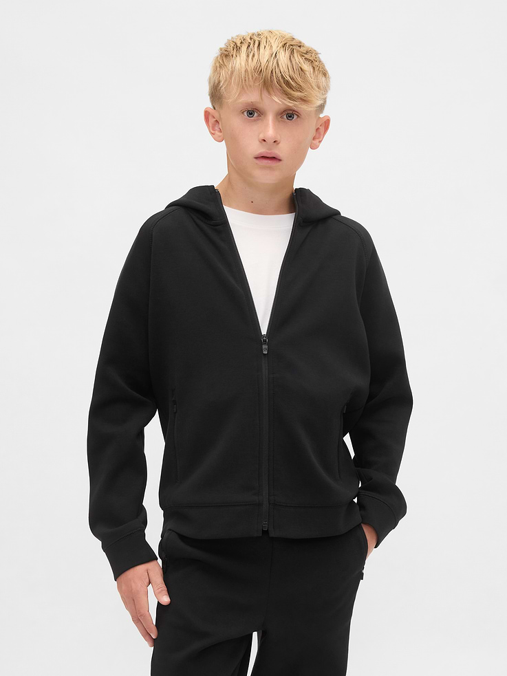 Image 1 of 5, Their favorite hoodie — now with an updated fit and softer, stretchier fabric., Soft, stretchy cotton-blend active knit hoodie., Hooded neckline., Long sleeves., Zipper front., Zippered slant pockets., Made with 25% recycled polyester. Compared to virgin materials, using recycled materials helps reduce resource use and waste., This product was made in a factory that invests in gender equity and women’s empowerment through RISE. Learn more at gapinc.com/equity ., Product #801428