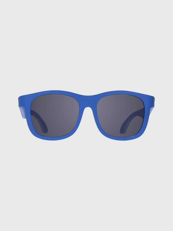 Image 1 of 3, Classic Navigator Babiators sunglasses make sure your little one is the coolest kid around., Award-winning Babiators sunglasses for babies, toddlers & kids with 100% UV protection and flexible, durable frames., Babiators sunglasses are highly durable, featuring flexible rubber frames and impact and shatter resistant lenses that won’t break when you bend, twist, or step on them., Each pair comes with a microfiber storage bag that doubles as a cleaning cloth to keep your little one’s shades safe and clean.