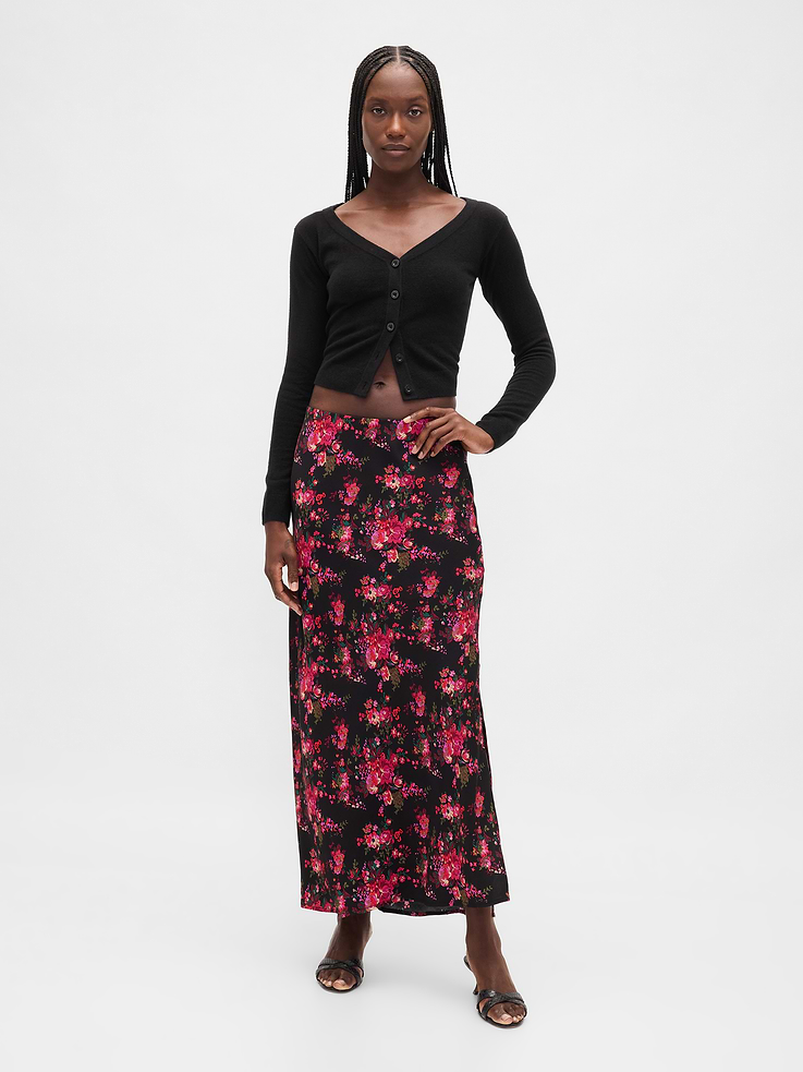 Image 1 of 5, Smooth woven twill bias-cut easy maxi slip skirt., Elasticized waist., Side slit., Certain styles have an allover print., Made with 100% LENZING™ ECOVERO™ viscose fibers, which are derived from controlled or certified wood sources., This product was made in a factory that invests in gender equity and women’s empowerment through RISE. Learn more at gapinc.com/equity., Product #797899