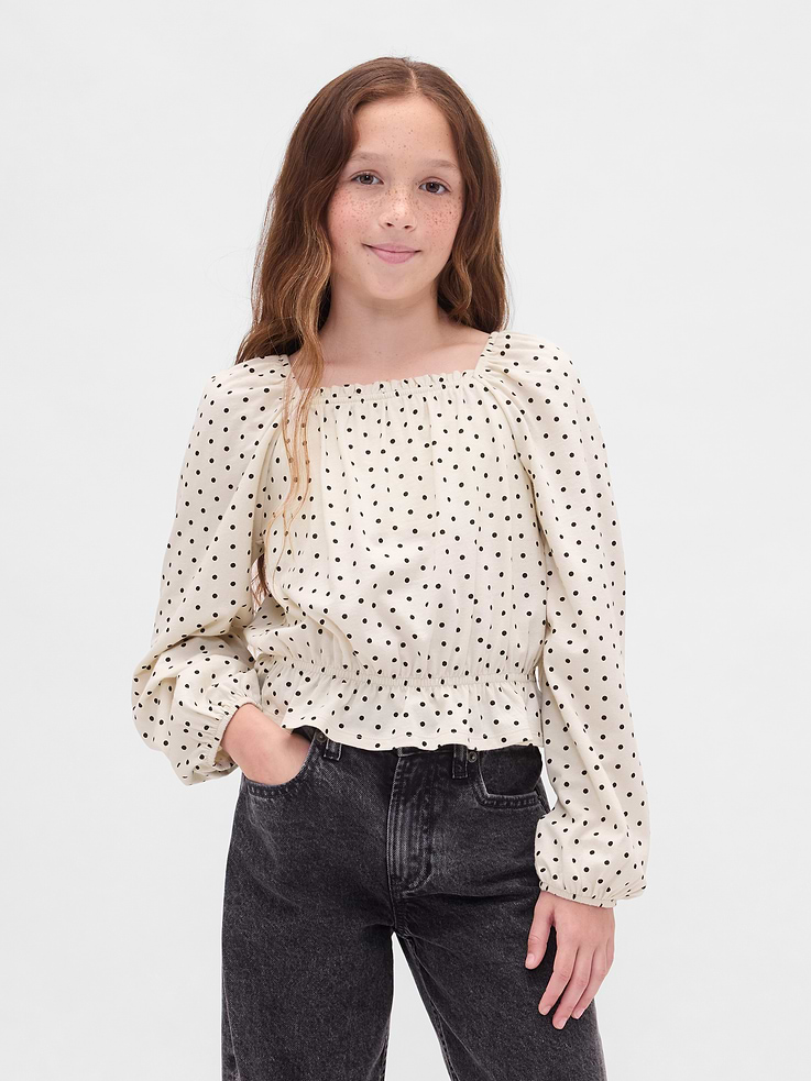 Image 1 of 5, Soft crinkle knit top., Square neck and back., Long raglan puff sleeves with elasticized cuffs., Elasticized waist., Peplum hem., Certain styles have an allover print., This product was made in a factory that invests in gender equity and women’s empowerment through RISE. Learn more at gapinc.com/equity., Product #841587