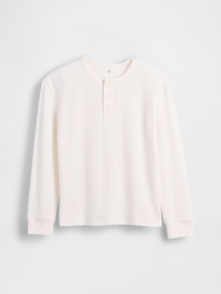 Image 1 of 2, Soft cotton relaxed T-shirt., Crewneck, Henley button placket., Long sleeves with banded cuffs., This product was made in a factory that invests in gender equity and women’s empowerment through RISE. Learn more at gapinc.com/equity., Product #827268