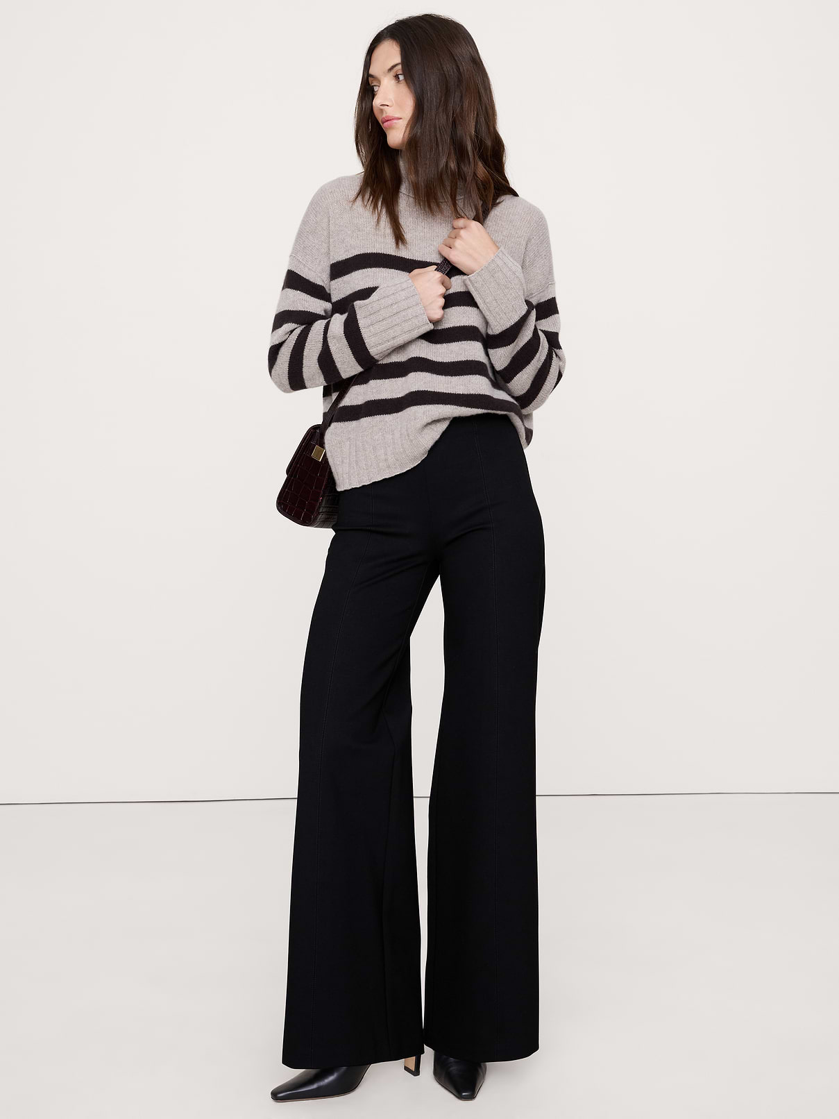 Image 1 of 8, This pull-on pant is designed to look (and feel) great on, cut from our Everywhere Ponte fabric—a favorite for its dressed-up look and high stretch for comfort., High Rise (12"). Fitted waist and hip with a straight fit through the thigh and wide leg. Full length., Elastic waistband (pull-on design)., No pockets., Unlined., Product #826938