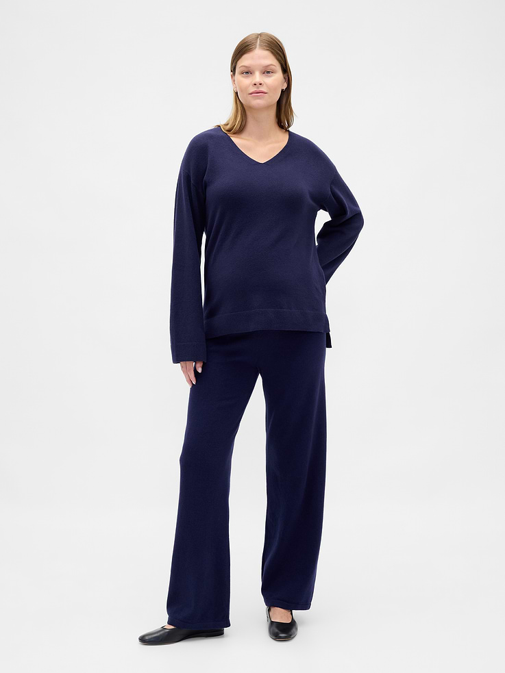Image 1 of 1, Our bestselling fabric that feels cashmere-soft. Crafted in a midweight plush yarn. Refined with a special brushed technique. It's everyday luxury., Supersoft knit maternity sweater pants., Elasticized waist with drawcords., Please note: Maternity styles cannot be returned in store. Please enjoy free returns by mail., This product was made in a factory that invests in gender equity and women’s empowerment through RISE. Learn more at gapinc.com/equity., Product #790573