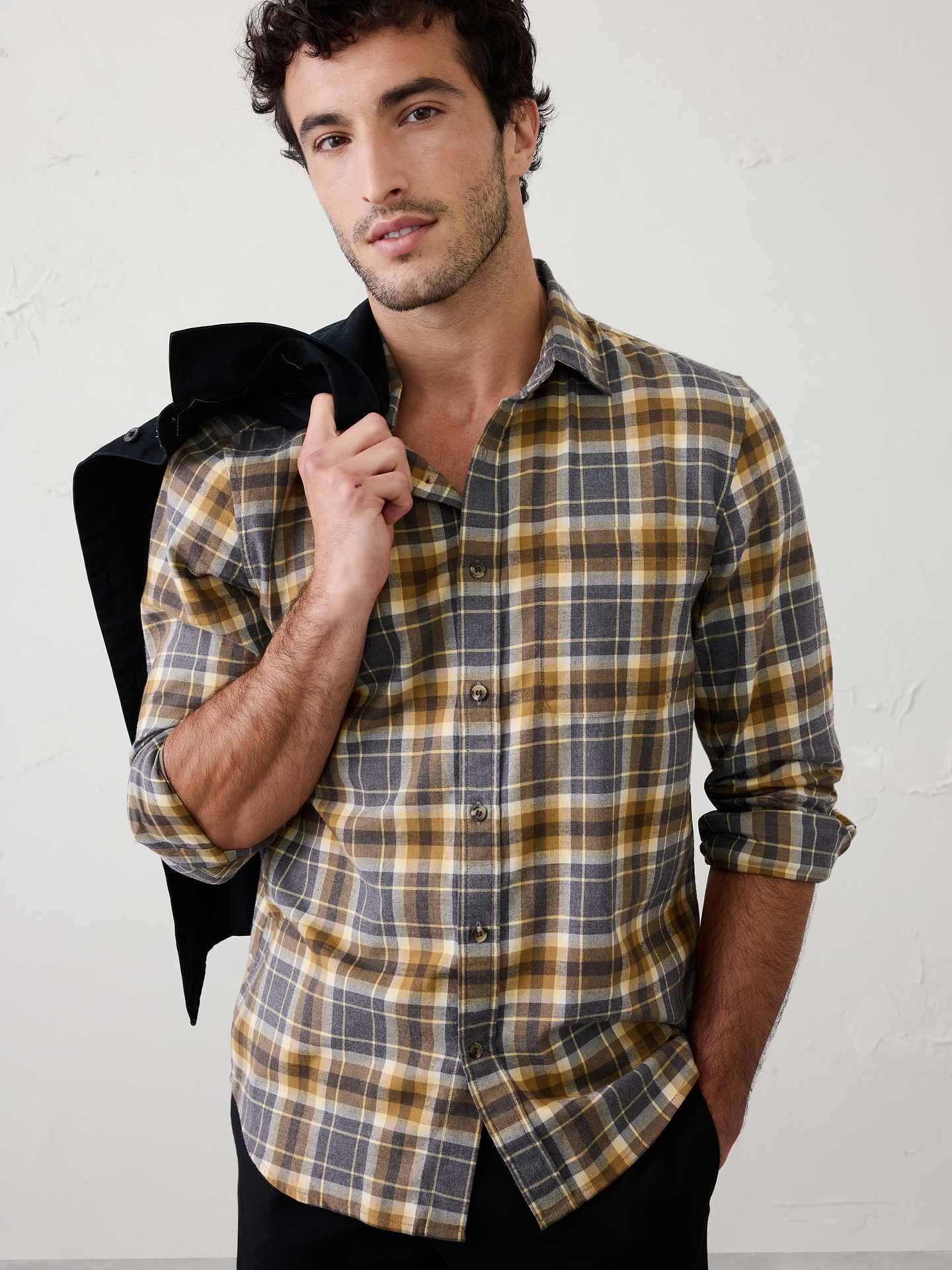 Image 1 of 1, A customer favorite for good reason—our Lightweight Flannel Shirt offers soft, breathable warmth. Perfect on its own or layered for cooler days., UNTUCKED FIT: Designed with a shorter hemline to hit right at the hips., Button down collar. Long sleeves with adjustable double-button barrel cuffs and button vents., Button front closure., Chest pocket., Back yoke., Shallow shirttail hem., Made exclusively for Banana Republic Factory., Product #782548