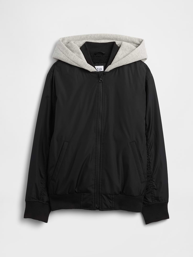 Image 1 of 3, Water-resistant outer., Fully lined (cozy sherpa lining at body)., Long sleeves with banded cuffs., Stand collar at hood, zip front., Front slant pockets., Banded hem., This product was made in a factory that invests in gender equity and women’s empowerment through RISE. Learn more at gapinc.com/equity., Product #844697