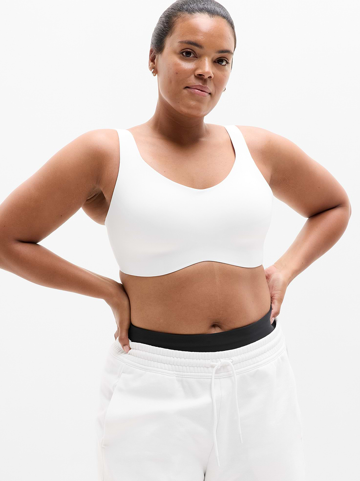 Image 1 of 6, BEST FOR CARDIO: run + train + HIIT, IMPACT: For high-impact workouts, best for B-DD cups, FEEL: Lightweight and smooth with sculpted support, FAVE: Ultra-lightweight spacer pad features a curved under bust and smooth construction, Adjustable and convertible straps, Back clasp for on/off ease, Product #768274