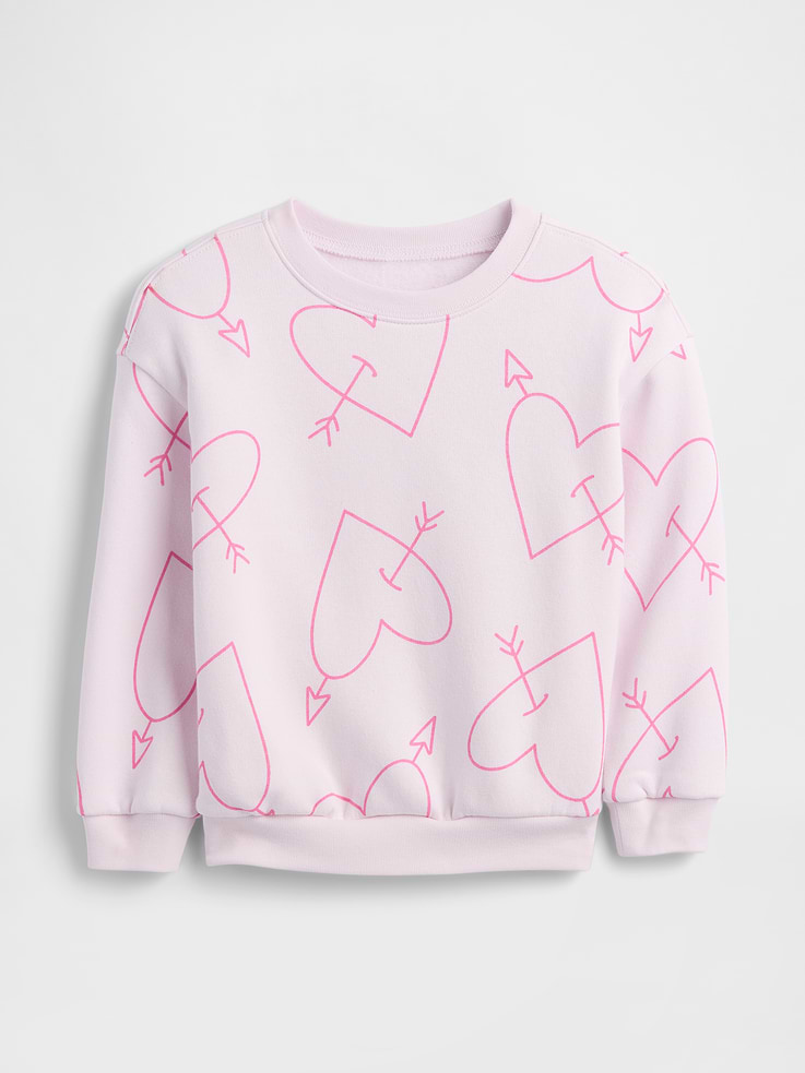 Image 1 of 4, This product is made with/contains 21% recycled polyester. Compared to virgin materials, using recycled materials helps reduce resource use and waste., Soft, comfy fleece., Dropped shoulder, long sleeves with banded cuffs., Crewneck., Assorted graphics at front., Banded hem., This product was made in a factory that invests in gender equity and women’s empowerment through RISE. Learn more at, Product #844787
