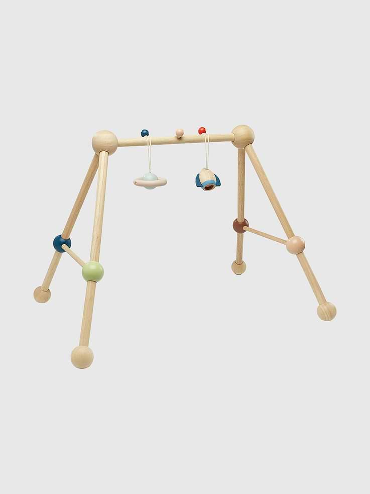 Image 1 of 4, Give your baby a workout with this activity gym, which includes two suspended toys to stimulate your child’s curiosity., The items can be detached for later stages of development, and the structure is designed with four legs to prevent rocking and ensure child safety.