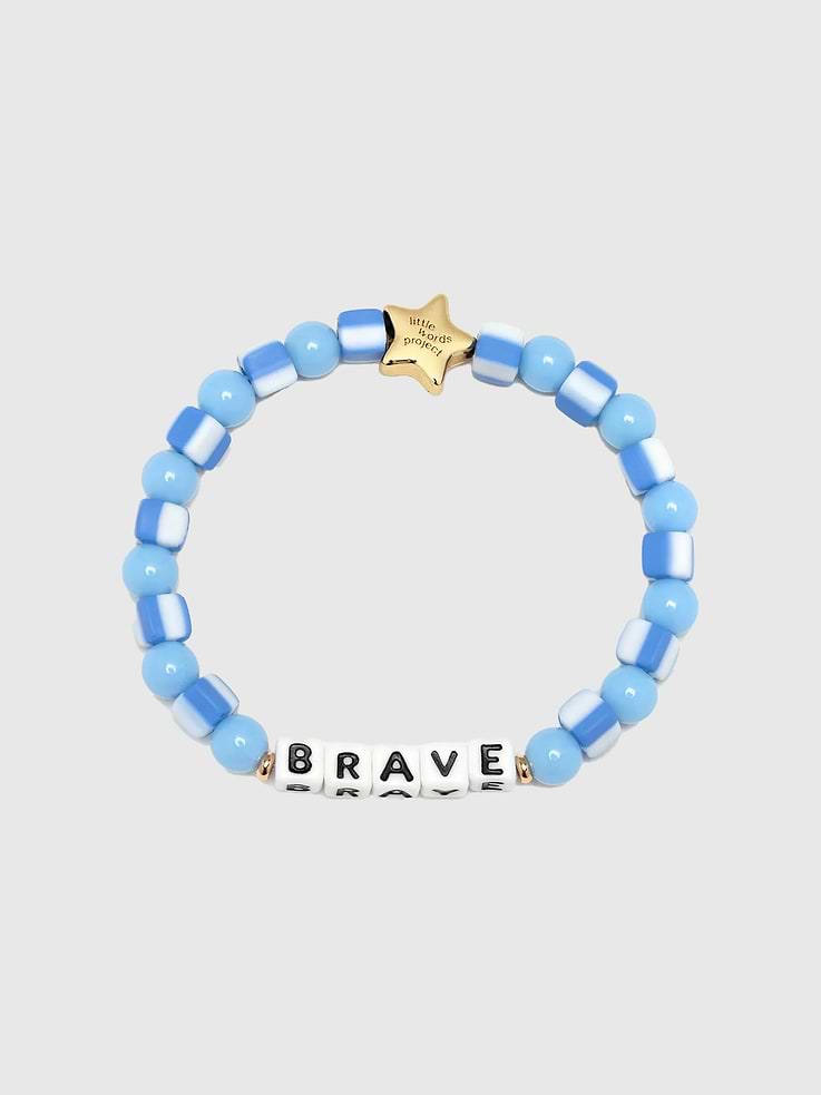 Image 1 of 2, Some days call for a little extra courage., With cool blues and a message that speaks to your strength, this bracelet brings confidence with every wear., It's bold, bright, and full of heart. Perfect for everyday bravery.