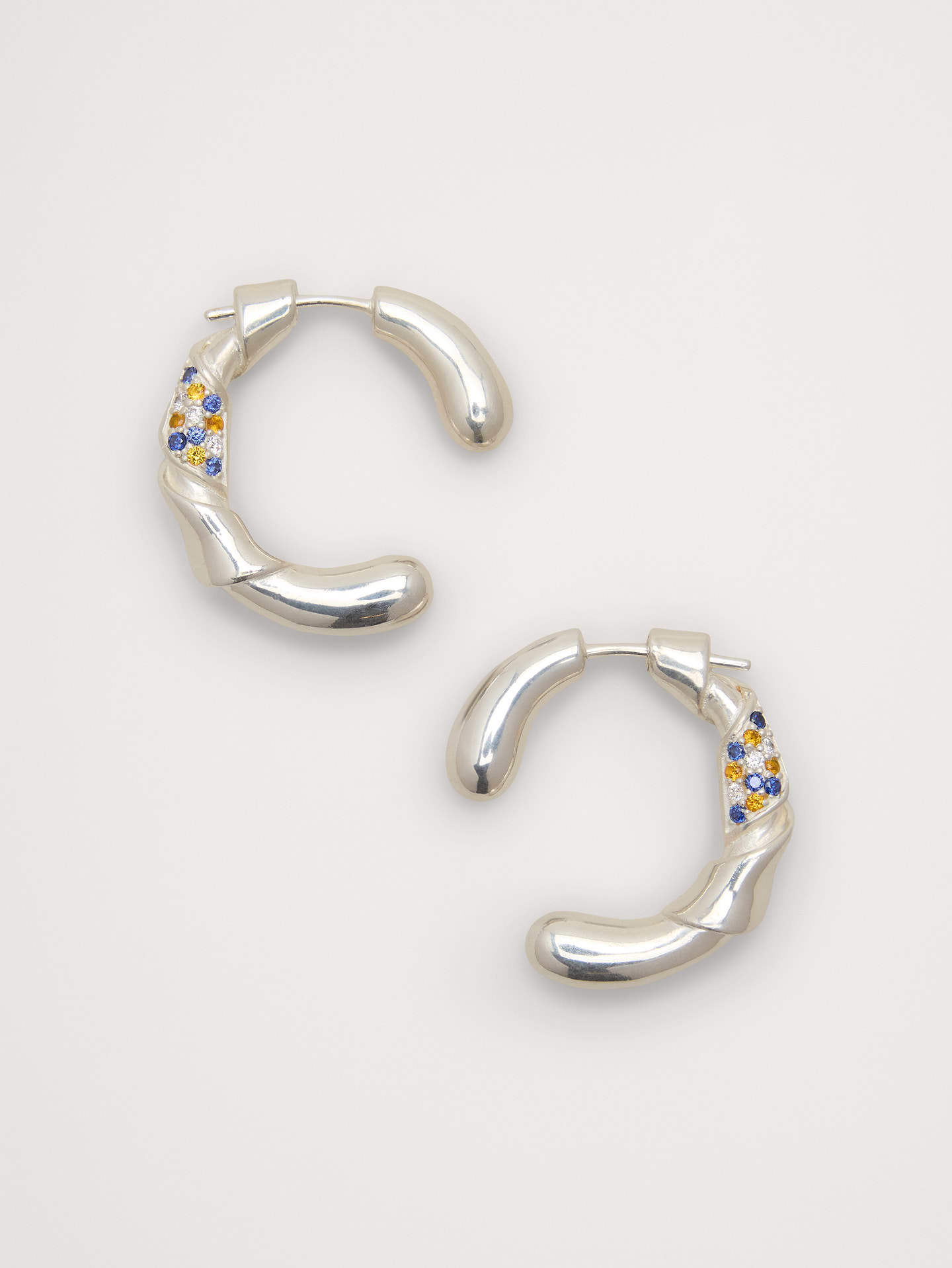 Image number 1 showing, Rhinestone Ribbon Hoop Earrings