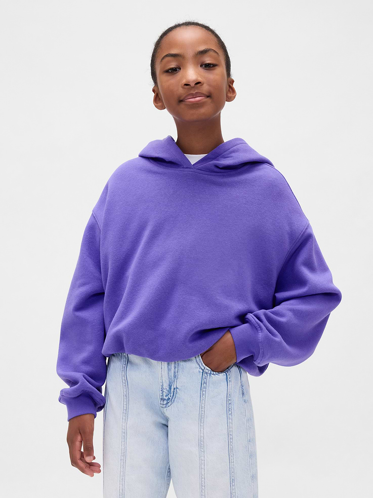 Image 1 of 5, Our softer than soft sweats. Brushed on the inside. Smooth on the outside. Made so that no two are alike., Soft cotton-blend fleece oversized hoodie., Hooded neckline., Long sleeves with drop shoulders and banded cuffs., Bubble hem., Made with 21% recycled polyester. Compared to virgin materials, using recycled materials helps reduce resource use and waste., This product was made in a factory that invests in gender equity and women’s empowerment through RISE. Learn more at gapinc.com/equity ., Product #814828