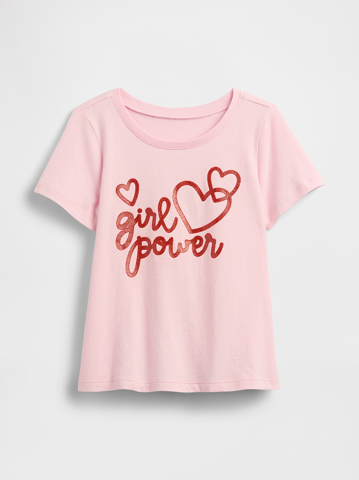 Image 1 of 3, Soft jersey knit., Short sleeves., Crewneck., Assorted graphics at front., This product was made in a factory that invests in gender equity and women’s empowerment through RISE. Learn more at gapinc.com/equity., Product #1171824