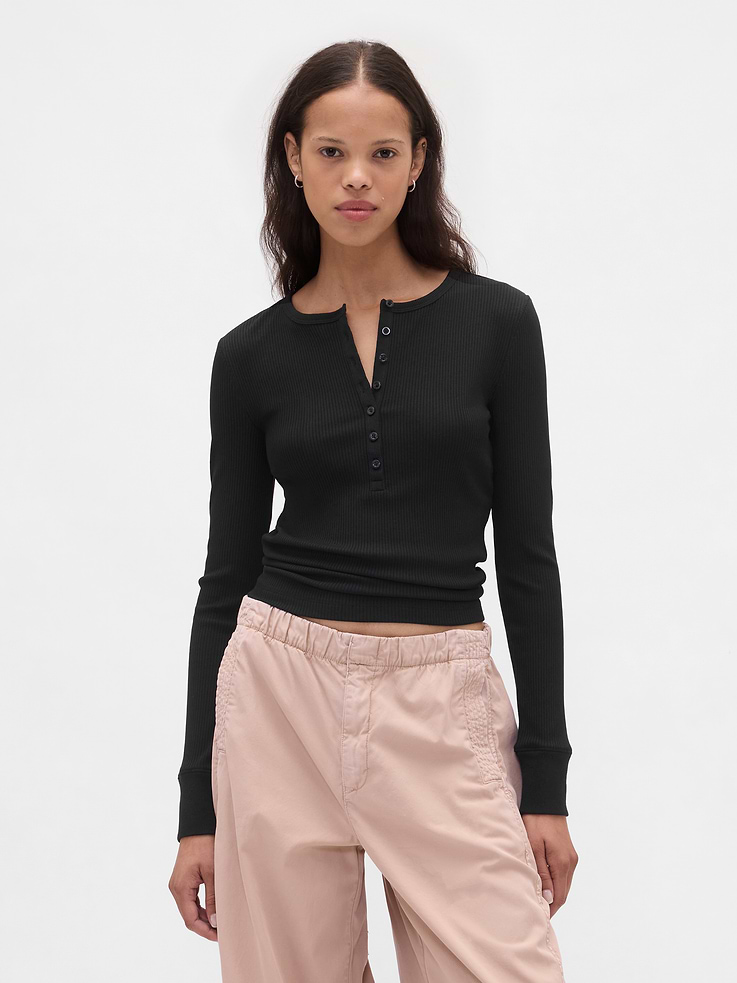 Image 1 of 5, Our soft & stretchy cotton-modal blend that hugs you just right. It’s your new 7-days-a-week essential., Soft, stretch cotton-modal blend T-shirt., Crewneck with Henley button placket., Long sleeves., This product was made in a factory that invests in gender equity and women’s empowerment through RISE. Learn more at gapinc.com/equity., Product #823332