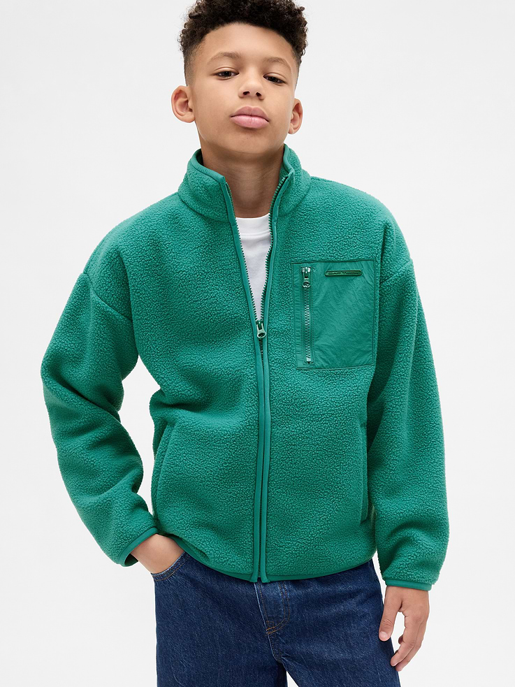 Image 1 of 6, Soft arctic sherpa relaxed jacket., Mockneck., Long sleeves with drop shoulders., Zipper front., Water-resistant nylon patch pocket with zip closure and Gap logo at chest., Front welt pockets., Made with 25% recycled polyester. Compared to virgin materials, using recycled materials helps reduce resource use and waste., This product was made in a factory that invests in gender equity and women’s empowerment through RISE. Learn more at gapinc.com/equity., Product #843506