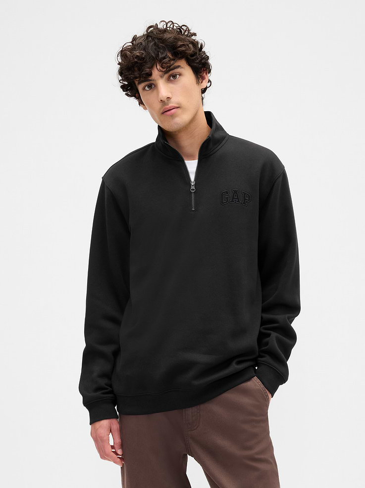 Image 1 of 4, This product is made with/contains 23% recycled polyester. Compared to virgin materials, using recycled materials helps reduce resource use and waste., Soft, comfy fleece., Dropped shoulder, long sleeves with banded cuffs., Stand collar, quarter-zip front., Gap logo at chest., Banded hem., Product #845177