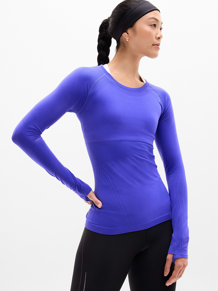 Image 1 of 6, FOR: Medium to high-impact workouts at the gym, studio or outdoors, FEEL: Seamless construction for maximum comfort and minimal chafing, FAVE: Grippers at inner hem prevent it riding up, Thumbholes hold sleeves in place and keep warmth in, Product #530524