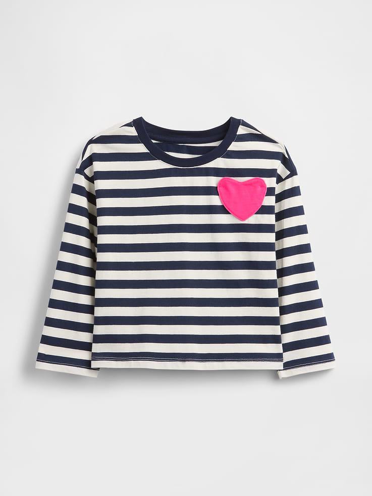Image 1 of 2, Our favorite mix-and-match essentials go from tummy time to playtime in no time. All made with soft cotton in playful prints and bright colors., Soft cotton jersey T-shirt., Crewneck., Long sleeves., Heart-shaped patch pocket at chest., Allover stripes., Made with 100% Protocol cotton verified by the U.S. Cotton Trust Protocol, a program which works with farms committed to improving their environmental footprint by minimizing water usage and improving soil diversity (Claim No. 10127)., Product #845109