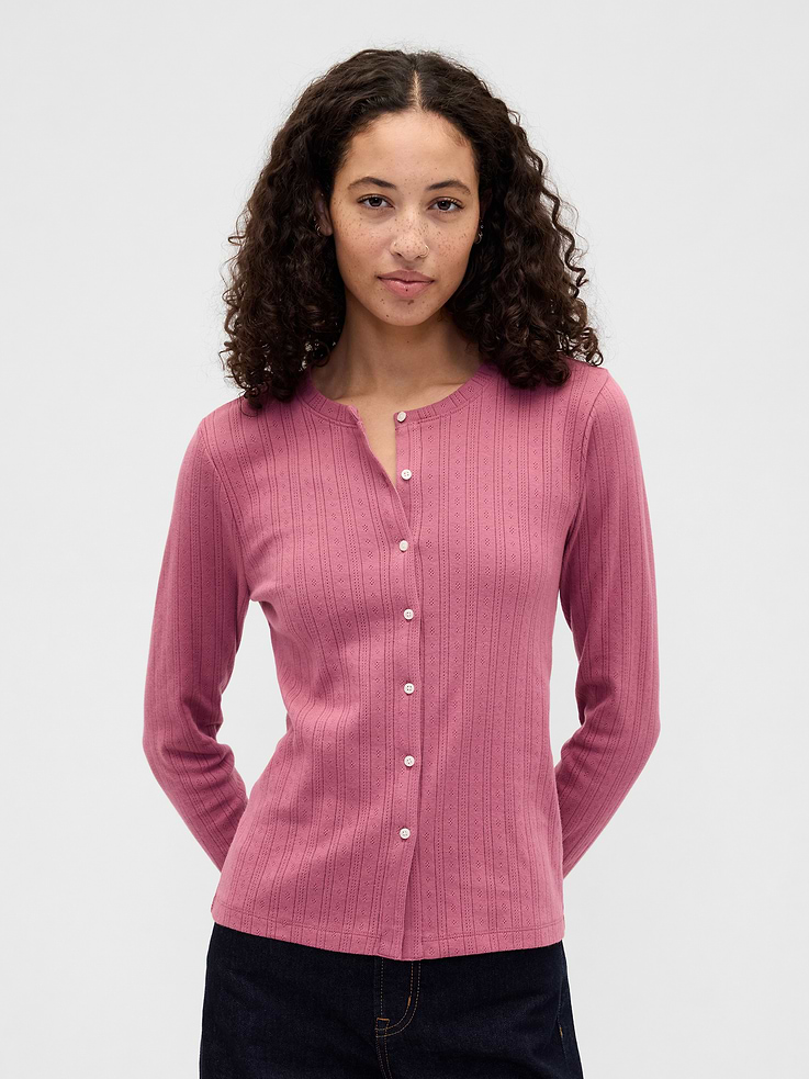 Image 1 of 5, Soft pointelle knit., Long sleeves., Crewneck, button front., Select styles have allover print., This product was made in a factory that invests in gender equity and women’s empowerment through RISE. Learn more at gapinc.com/equity., Product #1173238