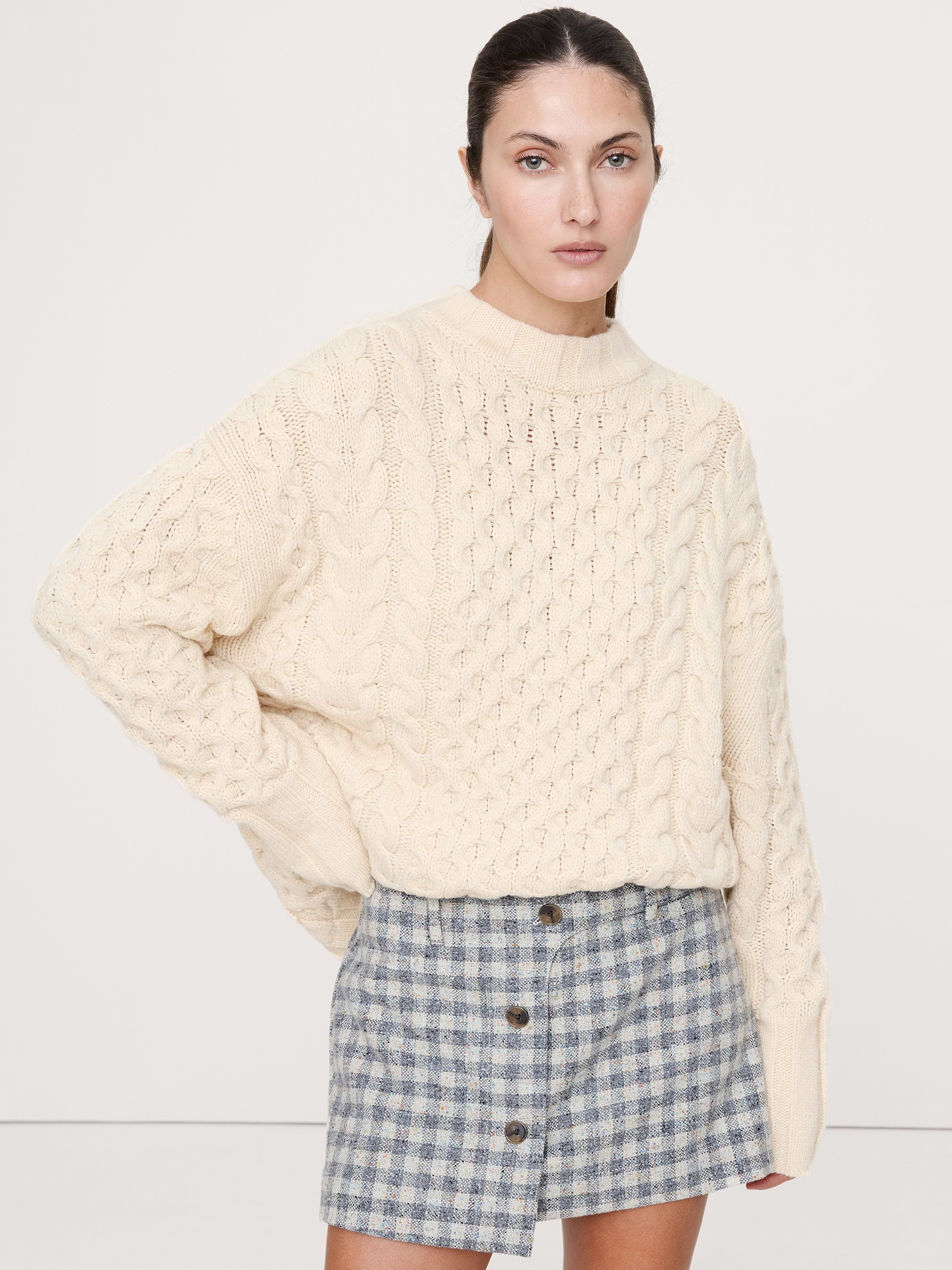 Image 1 of 5, A fresh take on the classic cable-knit sweater, we used a mix of cables and honeycomb stitches in our favorite Italian Merino-wool blend, in a longer tunic length so it's ultra-cozy., Oversized fit: Extra room through chest, shoulders, and waist. Dropped shoulder seams., Fabric from Italy's Filpucci mill., Crew neck., Straight hem., Product #852941