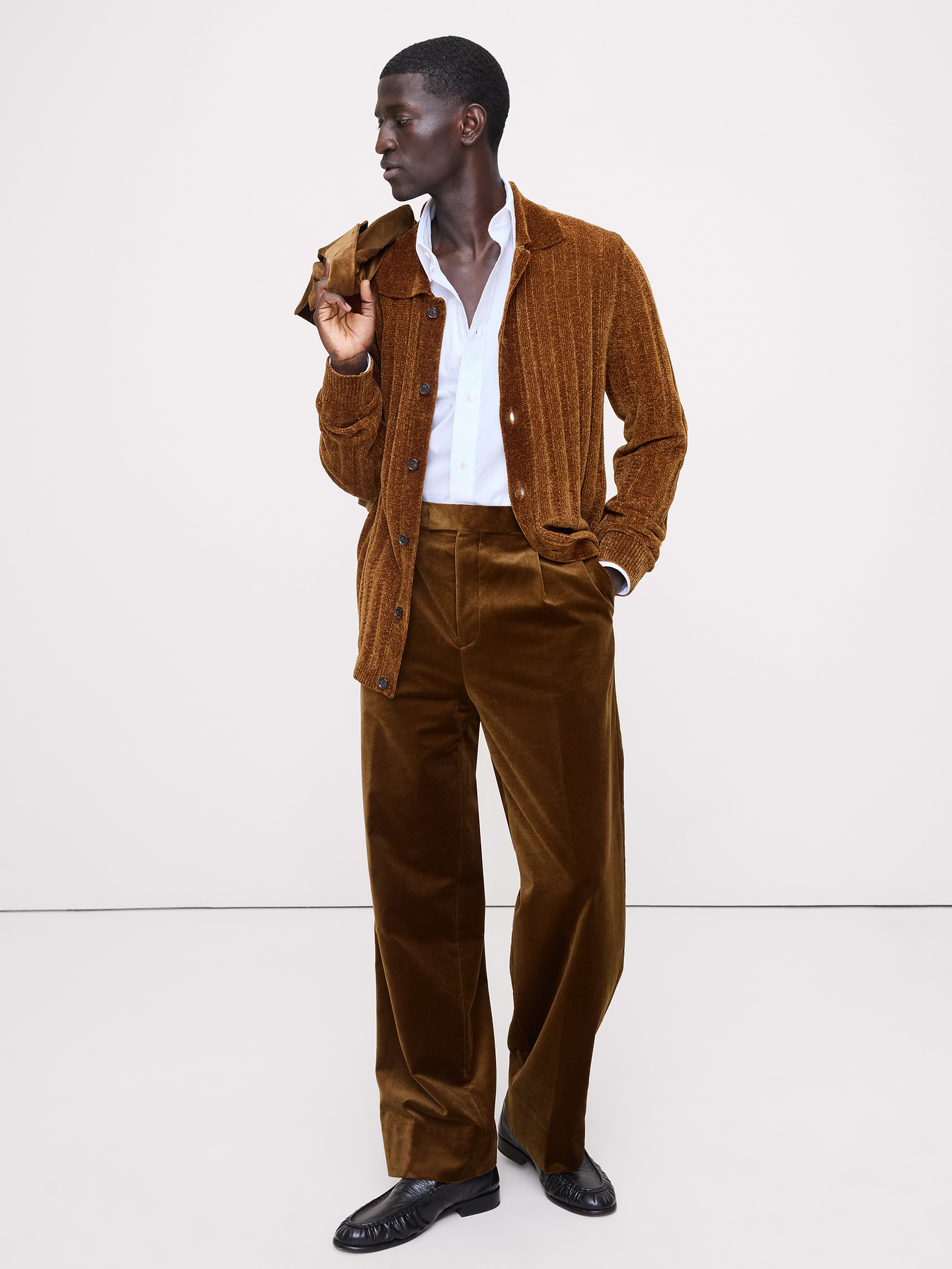 Image 1 of 5, When the occasion calls for something truly special, reach for this pleated velvet pant with it's distinctive break at the hem. We selected a beautiful cotton velvet for its construction, cutting the fabric pile-up to add to its luster., Relaxed Fit: High rise. Straight through hip and thigh. Wide leg with extra length for a break at the hem, Zip fly with hook-and-bar closure. Belt loops., Front and back pockets., Half lined (lined to the knee)., Product #816261
