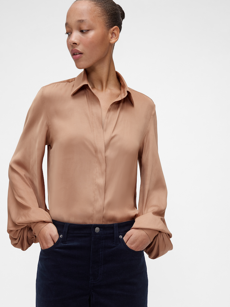 Image 1 of 2, Soft satin shirt., Spread collar., Long lantern sleeves with button cuffs., Hidden button front., Made with 100% recycled polyester. Compared to virgin materials, using recycled materials helps reduce resource use and waste., Product #867303