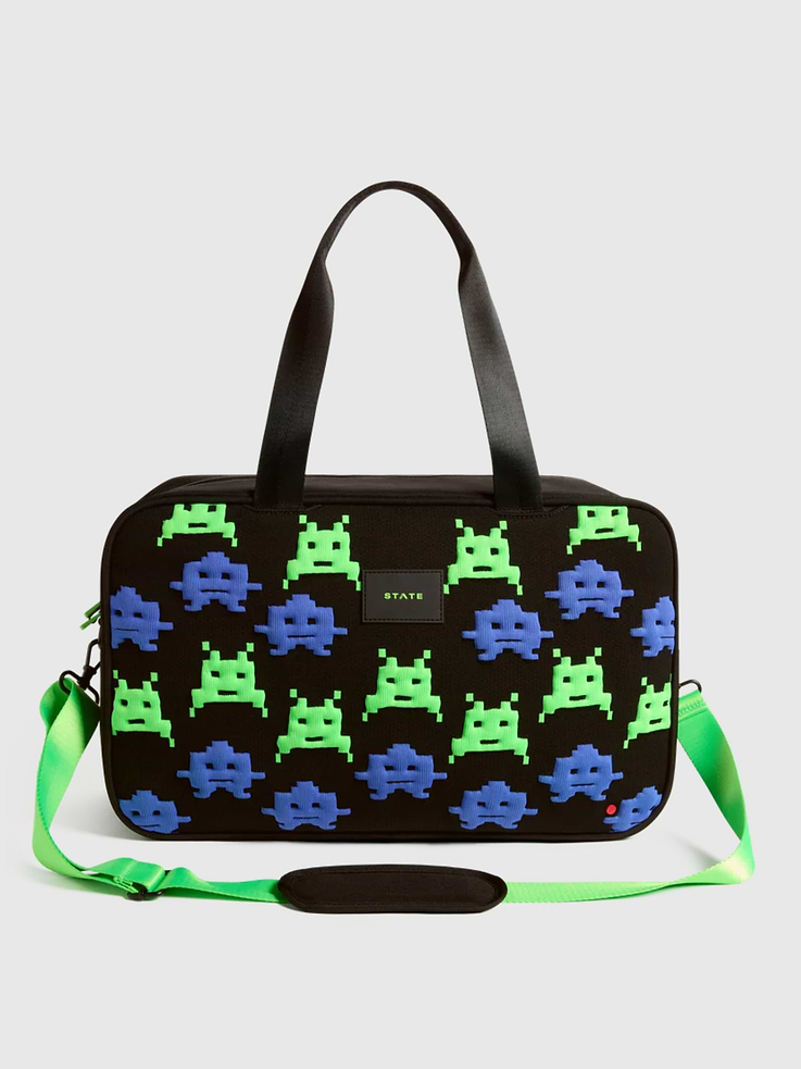 Image 1 of 5, Perfect for after-school activities, sleepovers, and weekend getaways., Designed with two handles and an adjustable crossbody strap for easy carrying., Detachable pouches for shoes and dirty clothes and interior pockets to keep everything organized., Made from recycled materials., For every bag sold, STATE donates a percentage of the proceeds to American families in need.
