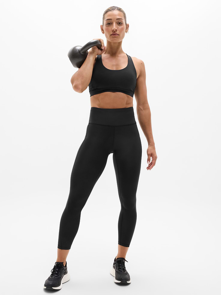 Image 1 of 7, FOR: Our highest-compression legging for medium to high-impact workouts at the gym, studio, or outdoors, FEEL: PowerMove fabric is engineered with interlock construction using 50-gauge knitting technology, offering sleek, compressive support and a no-slip fit, FAVE: Targeted perforation zones let sweat out and airflow in, Stay-put bonded waistband molds to your form as body heat rises, Ergonomic pocket construction offers streamlined storage, Fully adjustable continuous drawstring won't get lost in the wash, Product #769054