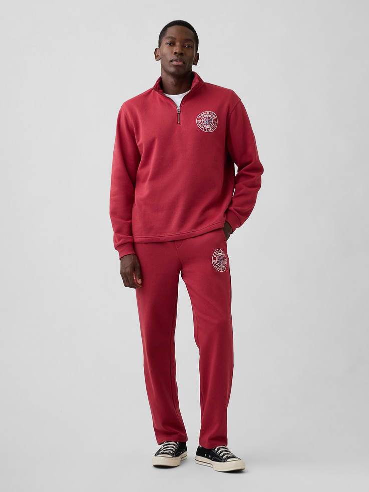 Image 1 of 4, This product is made with/contains 42% recycled polyester. Compared to virgin materials, using recycled materials helps reduce resource use and waste., Soft, comfy fleece., Drawcord ties at elasticized waist, faux fly., On-seam pockets., Graphic at hip., This product was made in a factory that invests in gender equity and women’s empowerment through RISE. Learn more at gapinc.com/equity., Product #1172614
