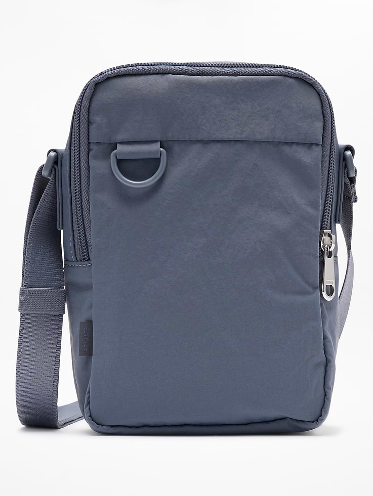 Image 1 of 4, FOR: Easy-access storage streamlined for the streets and beyond, FEEL: Ultralight and durable with a crisp, crinkled texture, FAVE: Internal pockets store small essentials, Ribbing provides extra comfort, Product #845117
