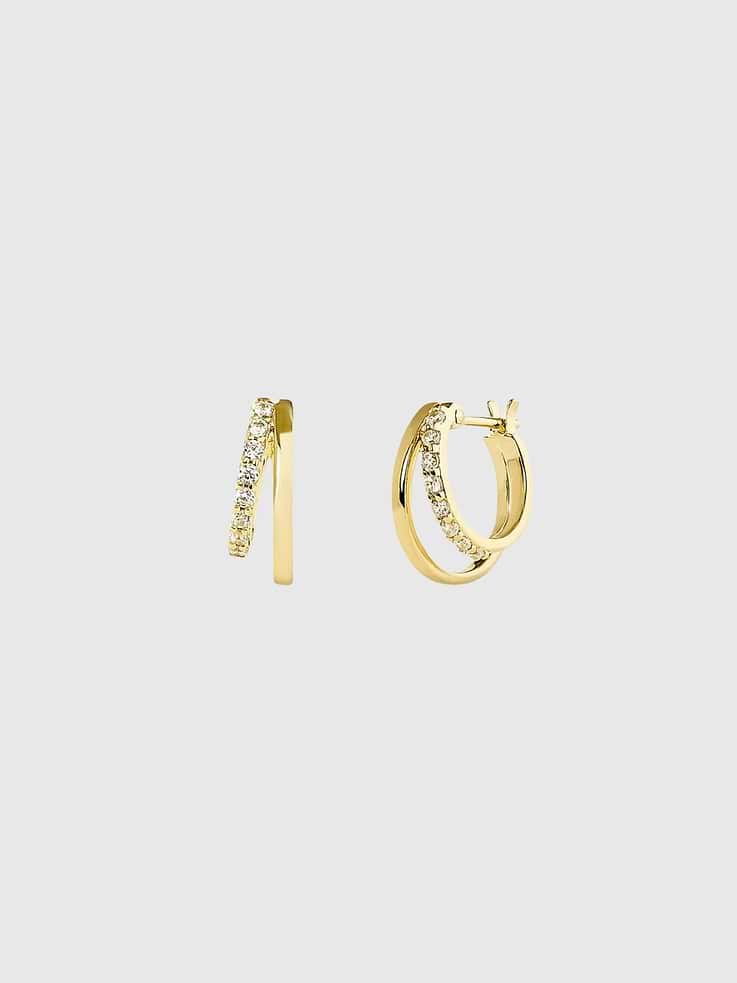 Image 1 of 3, Get a double-pierced look minus the commitment with these dainty, little double hoop earrings., These double huggie hoops are crafted in sterling silver then finished in a layer of 14K gold and littered with cubic zirconia gems for some extra sparkle., Wear these double hoop earrings alone or pair them with a few gold studs for a modest ear stack., Crafted in hypoallergenic sterling silver., Dipped in 14K gold., Tarnish-Free., Water-Resistant., Hypoallergenic., Ana Luisa is a jewelry brand founded in 2018 to elevate everyday, with Earth-friendly jewelry that lasts.