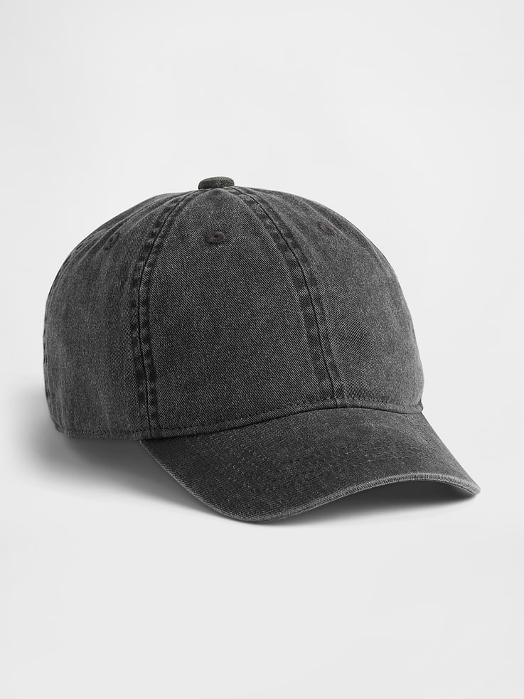 Image 1 of 2, Soft overdye cotton twill 6-panel baseball hat., Stitching at curved brim., Adjustable closure at back., Assorted colors., Note: Standout pink styles require separate care instructions. The dye used in the crafting of this product is prone to crocking, or color transfer. Please avoid contact with light-colored fabric or upholstery., This product was made in a factory that invests in gender equity and women’s empowerment through RISE. Learn more at gapinc.com/equity ., Product #883748
