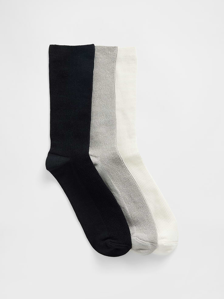 Image 1 of 2, Soft stretch knit crew socks., Reinforced toe and heel., Made with 20% recycled polyester. Compared to virgin materials, using recycled materials helps reduce resource use and waste., This product was made in a factory that invests in gender equity and women’s empowerment through RISE. Learn more at gapinc.com/equity ., Product #874937