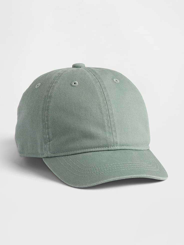 Image 1 of 2, Soft overdye cotton twill 6-panel baseball hat., Stitching at curved brim., Adjustable closure at back., Assorted colors., Note: Standout pink styles require separate care instructions. The dye used in the crafting of this product is prone to crocking, or color transfer. Please avoid contact with light-colored fabric or upholstery., This product was made in a factory that invests in gender equity and women’s empowerment through RISE. Learn more at gapinc.com/equity ., Product #883748