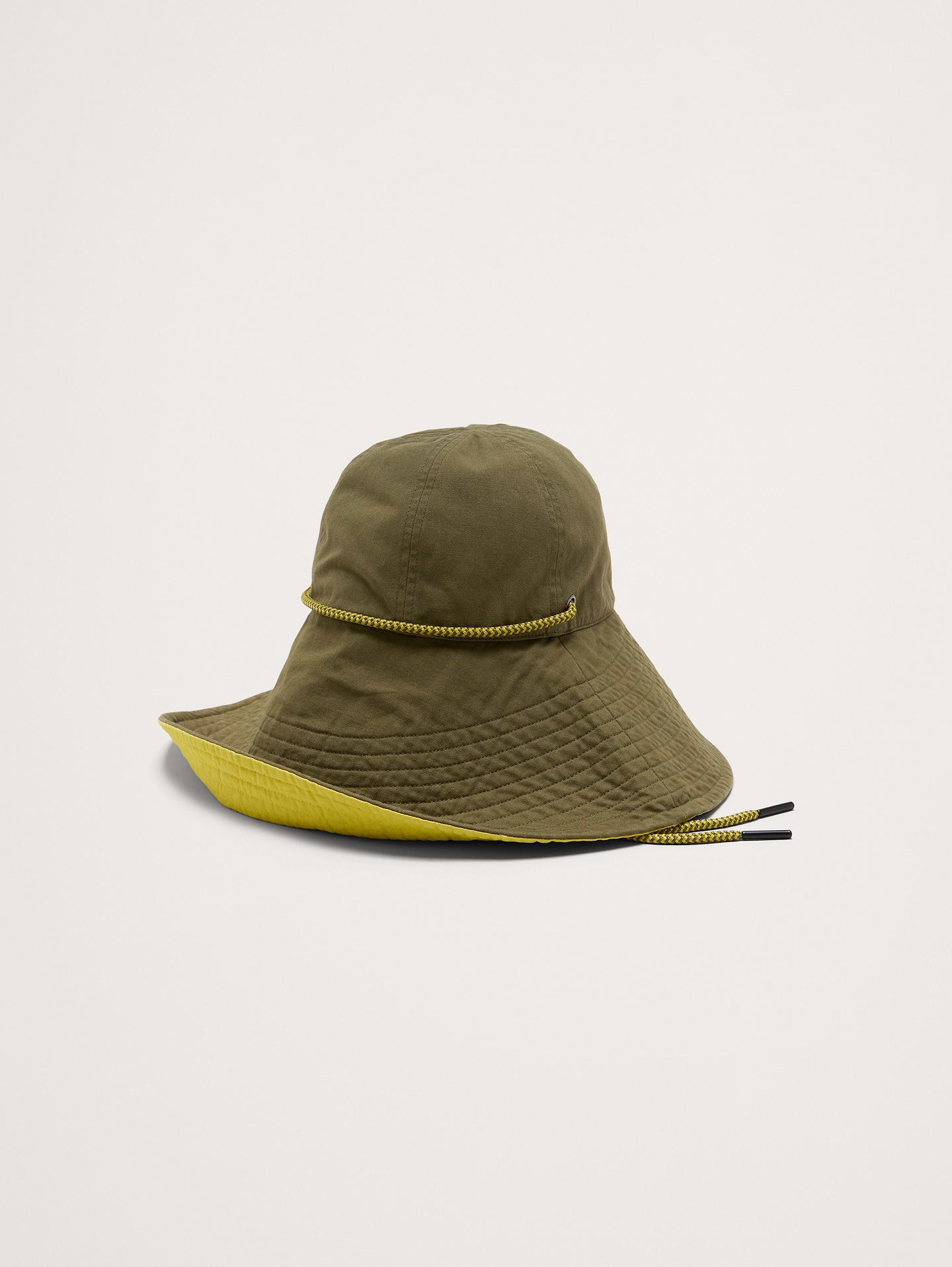 Image 1 of 1, A very cute hat, we cut this one with an extra-wide brim and added an interior pop of contrasting color for a bit of extra optimism., Drawstring strap., Product #870734