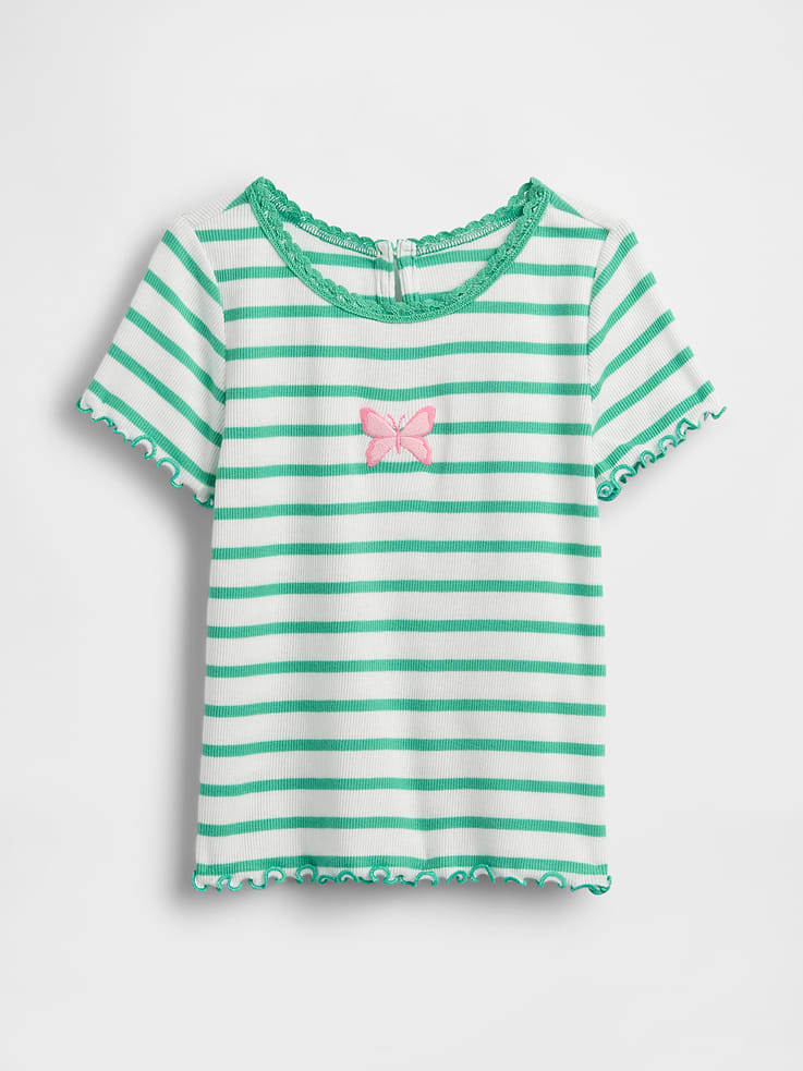 Image 1 of 3, Soft ribbed knit cotton T-shirt., Round neck with keyhole closure at back., Short sleeves with ruffle trim., Ruffle hem., Assorted embroidery at front., This product was made in a factory that invests in gender equity and women’s empowerment through RISE. Learn more at gapinc.com/equity ., Product #882043