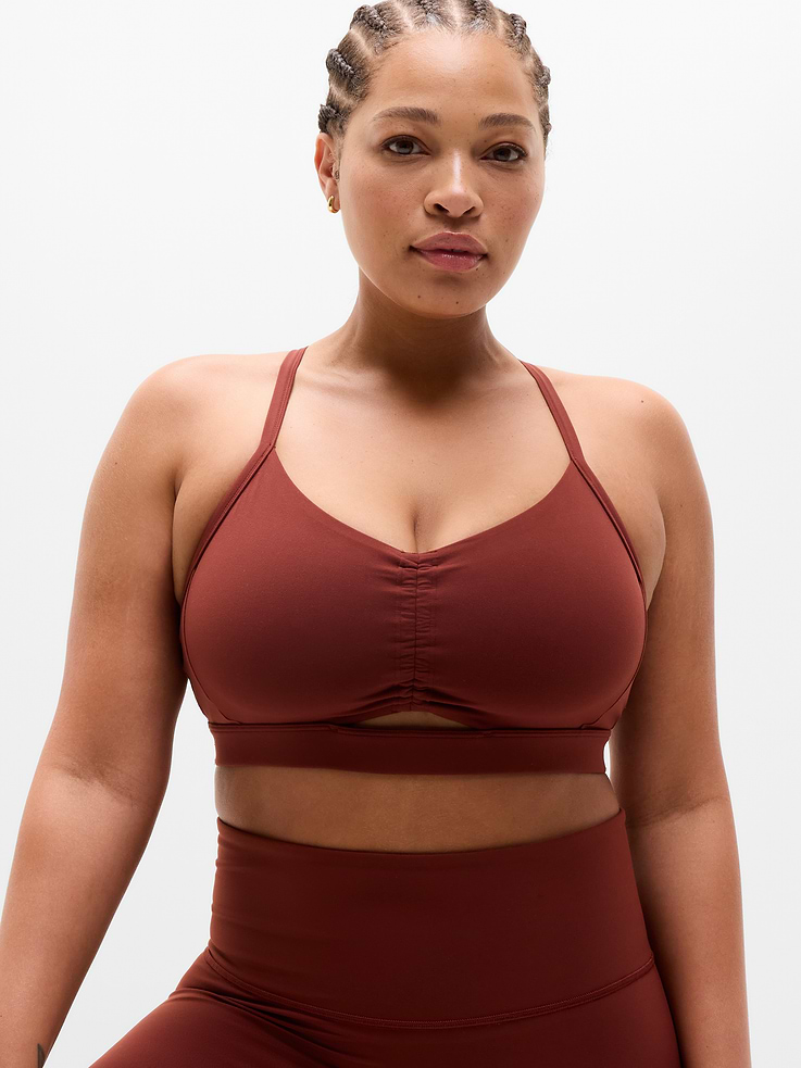 Image 1 of 5, BEST FOR STUDIO: yoga + barre + pilates, IMPACT: Light-impact workouts, best for D-DD cups, FEEL: Powervita fabric is buttery soft with support that feels like a gentle hug, FAVE: Sleek racerback design provides distraction-free mobility and airflow, Built-in pockets with removable pads for optional coverage, Removable pads hold their shape from wash to wear, Lined with PowerMesh for breathable, sheer-proof coverage, Product #844716