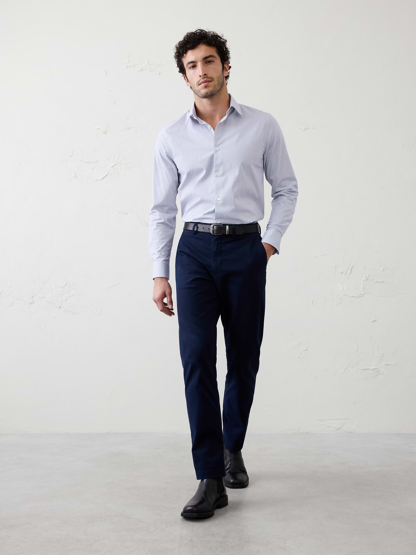Image 1 of 8, WRINKLE RESISTANT: No need to iron, this soft, dress shirt is specially engineered to resist wrinkles so it stays looking crisp and pulled-together., Spread collar. Long sleeves with adjustable double-button barrel cuffs and button vents., Button front closure., Back yoke., Shirttail hem., Made exclusively for Banana Republic Factory., Product #708966